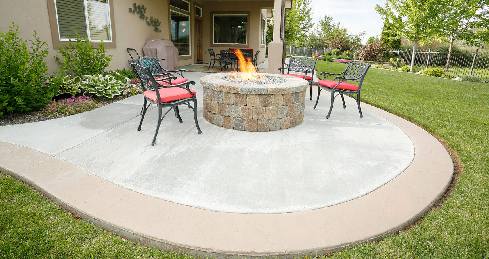 Beautiful concrete patio with fire pit